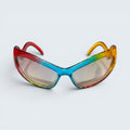 STOXX THRIFT & VINTAGE Eclare sunglasses with a transparent acetate frame featuring a red, blue, green, and amber gradient.