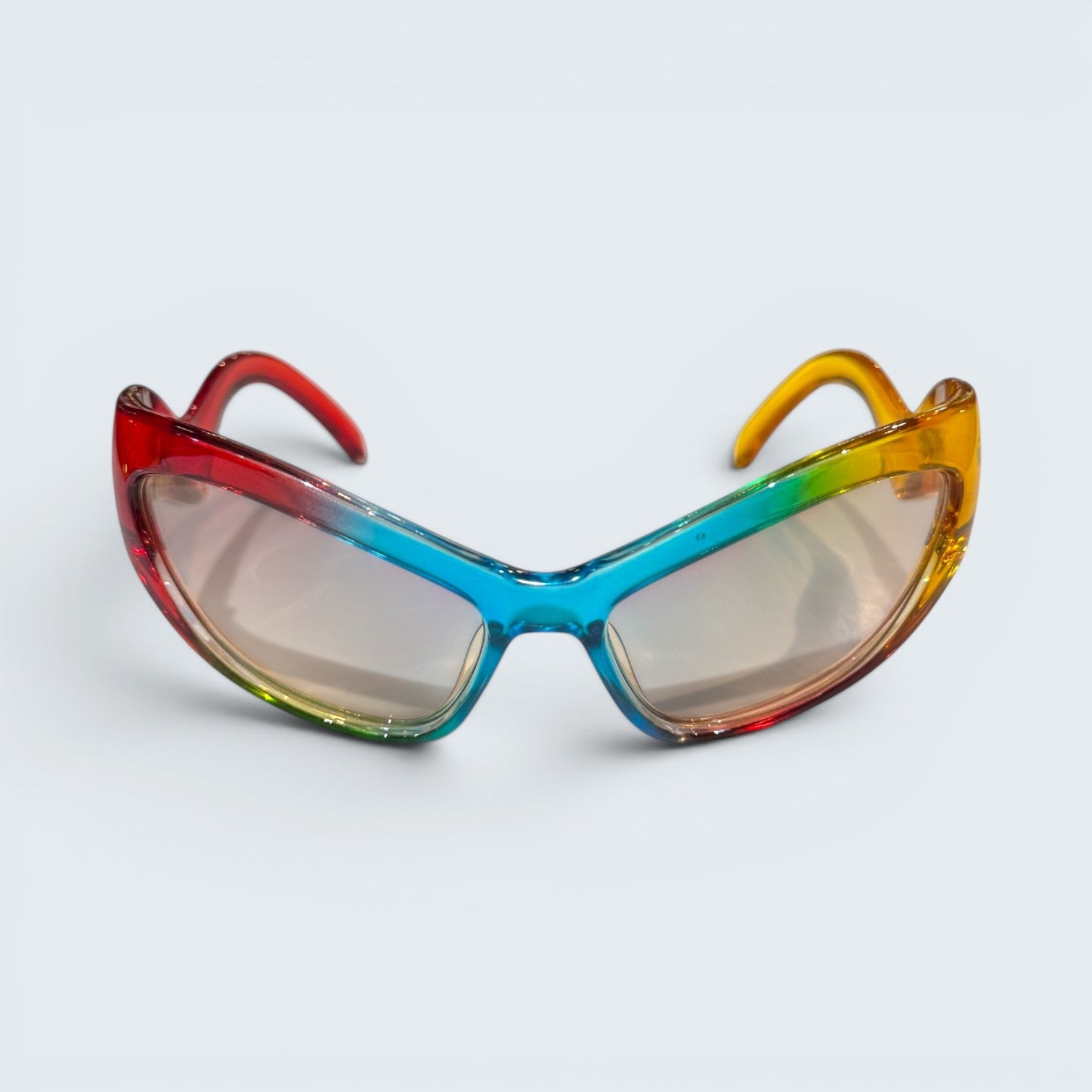 STOXX THRIFT & VINTAGE Eclare sunglasses with a transparent acetate frame featuring a red, blue, green, and amber gradient.